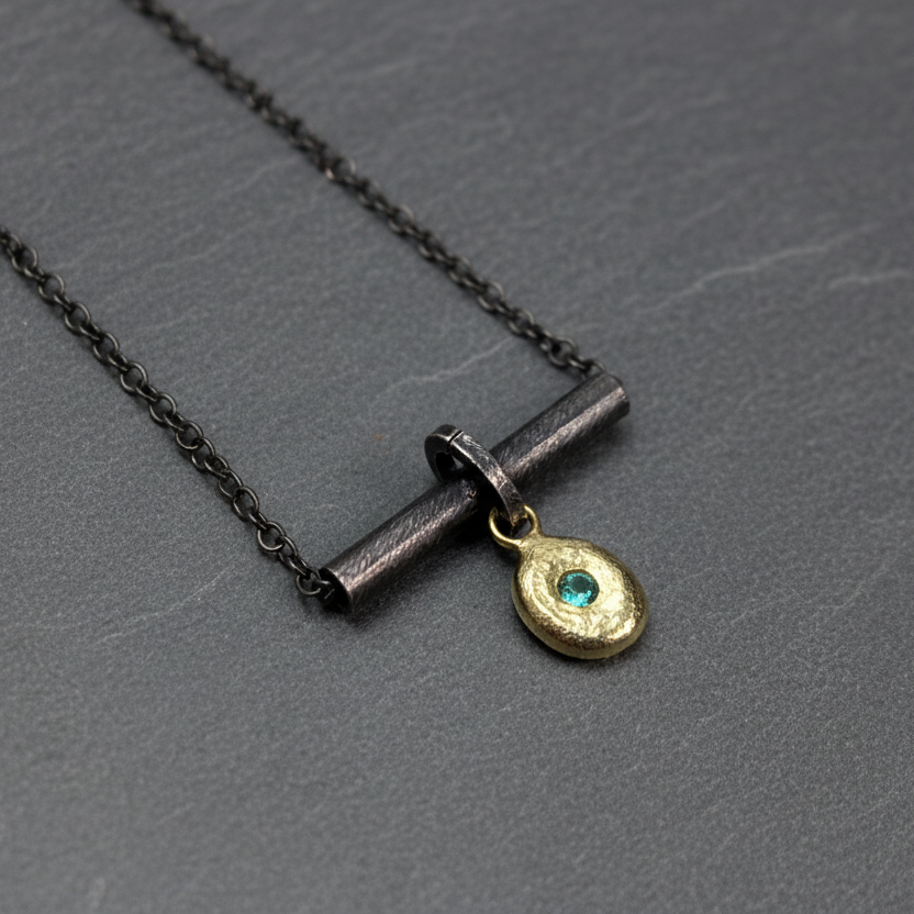ANNE MORGAN - Oxidised Tube & Chain with 18ct Gold Emerald Pendant