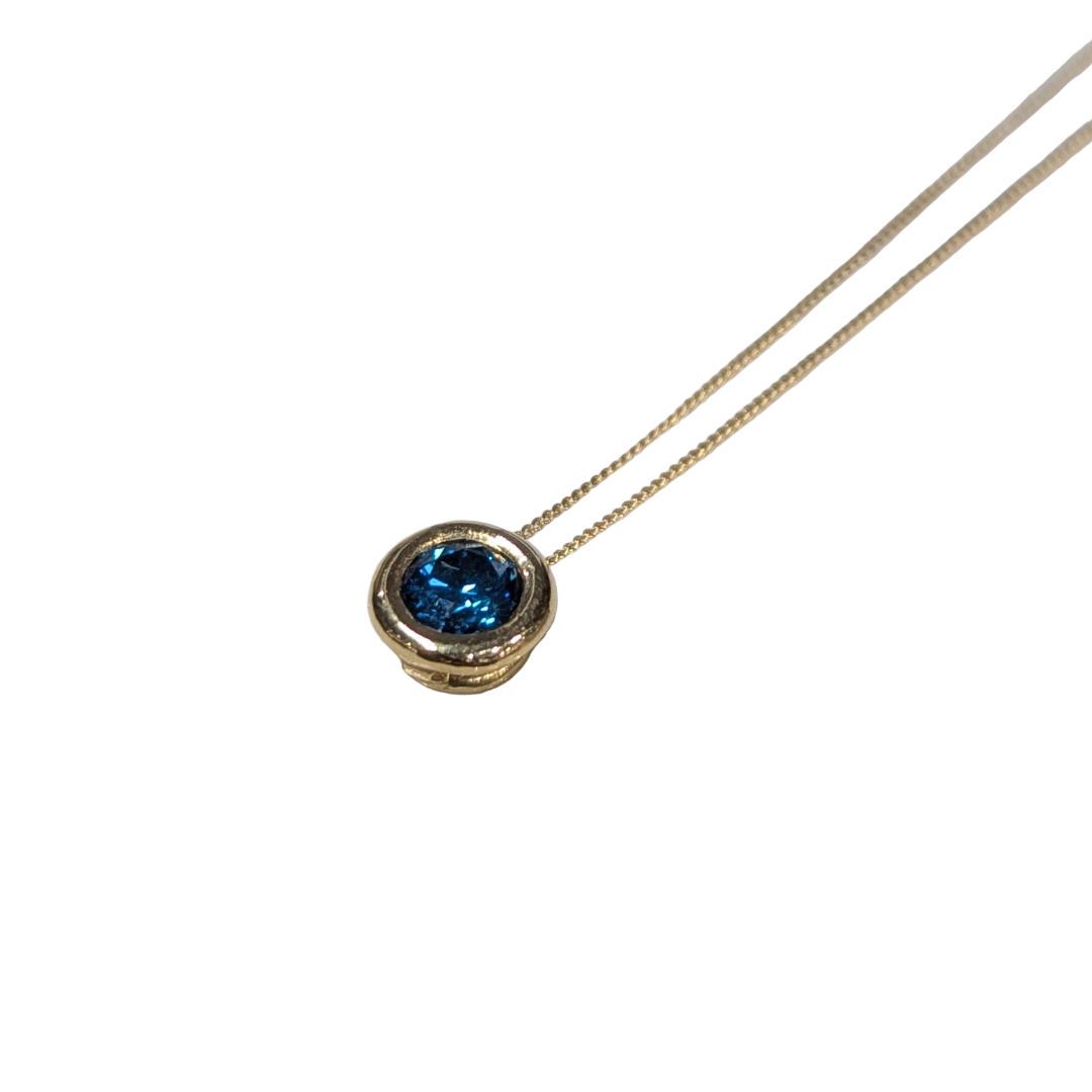 ANNE MORGAN - Blue Diamond Pendant in 18ct yellow gold.