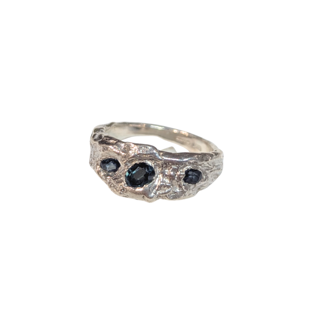 CLAIRE QUICK - Beneath the Surface carved textured ring with 3 Malawi Teal Oval Sapphires ring