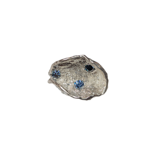 CLAIRE QUICK - Deep off set textured cup ring with 3 blue moissanites in the cup