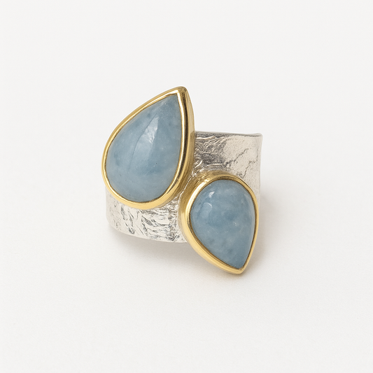 ANNE MORGAN - Luna ring with two pair shape cabochon aquamarines