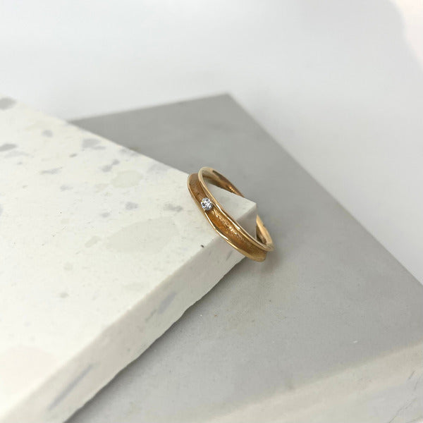 KATE HODGSON - 18ct Rose Gold Tension Set Single Diamond Band
