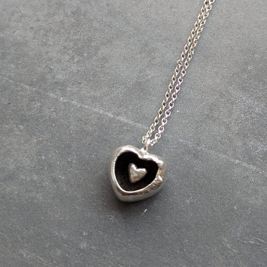 CLAIRE QUICK - Hand carved silver heart with interior oxidised and small heart
