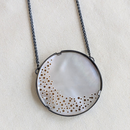 ANNE MORGAN - Mother of Pearl erosion pendant on oxidised chain