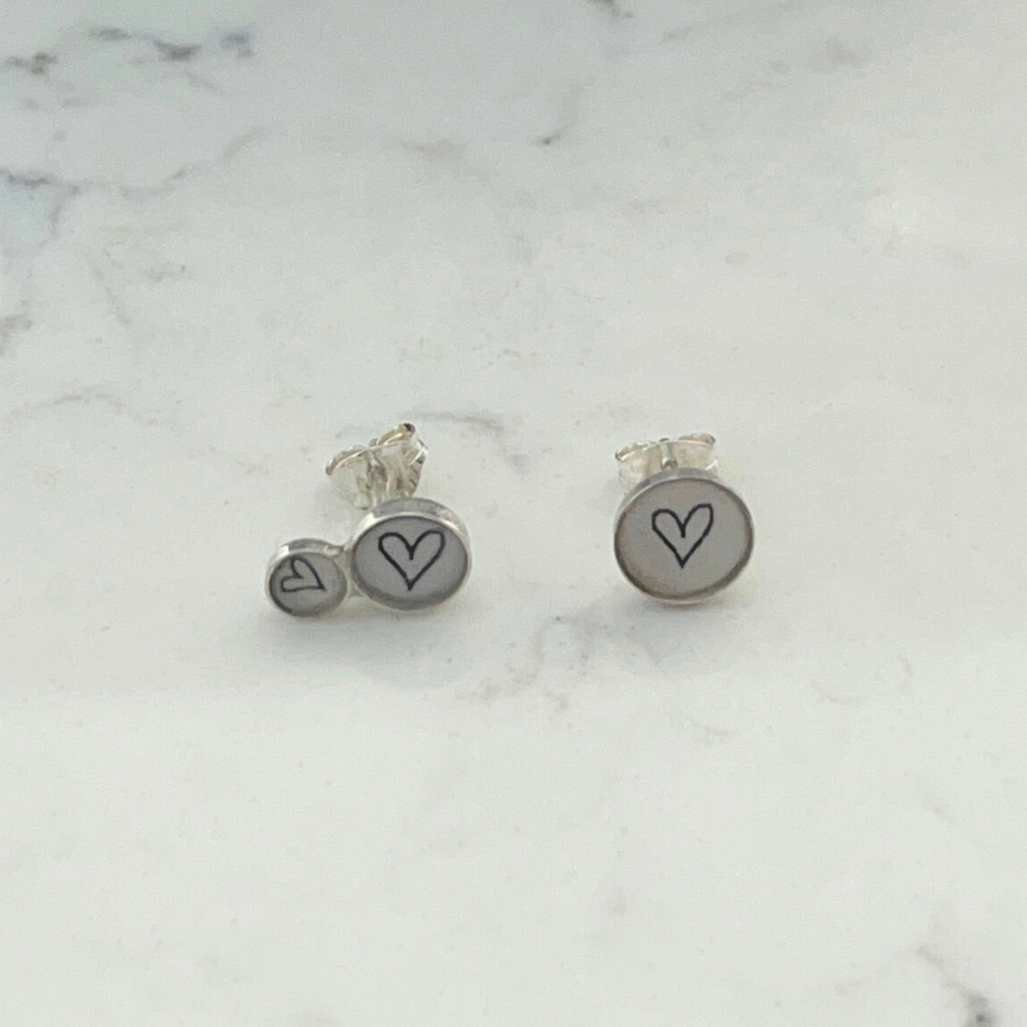CLARE COLLINSON - Offset Sterling Silver Studs - Black Outlined Hearts