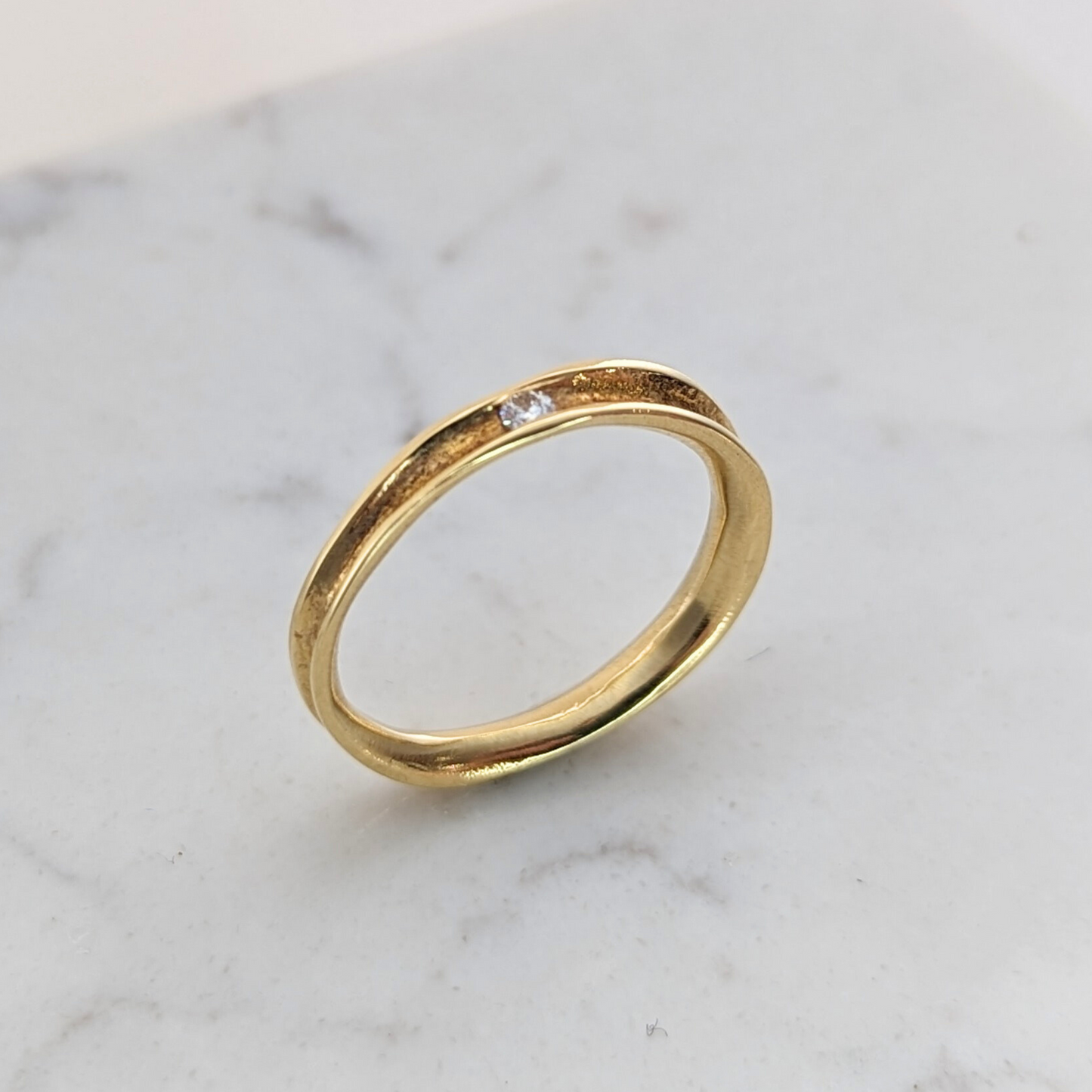 KATE HODGSON - 18ct Yellow Gold Tension Set Single Diamond Band