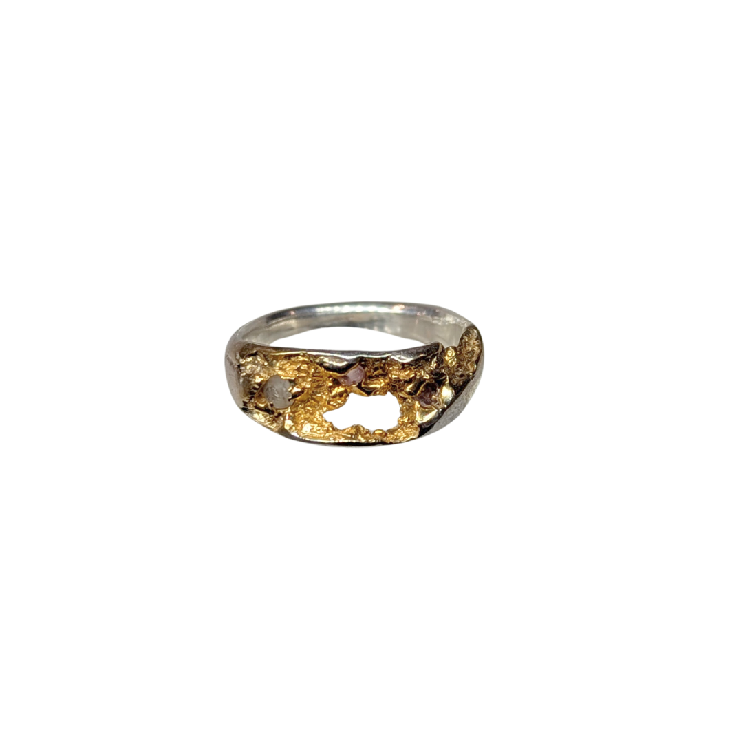 CLAIRE QUICK - Beneath the Surface carved textured sterling silver ring with 3 different shades of pink  sapphires, and the textured surface gold plated