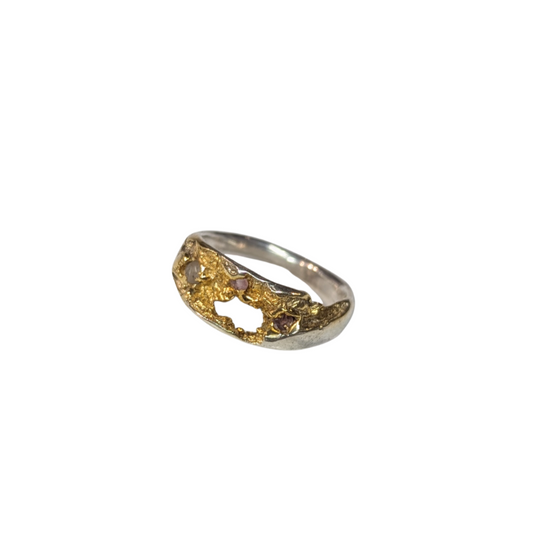 CLAIRE QUICK - Beneath the Surface carved textured sterling silver ring with 3 different shades of pink  sapphires, and the textured surface gold plated