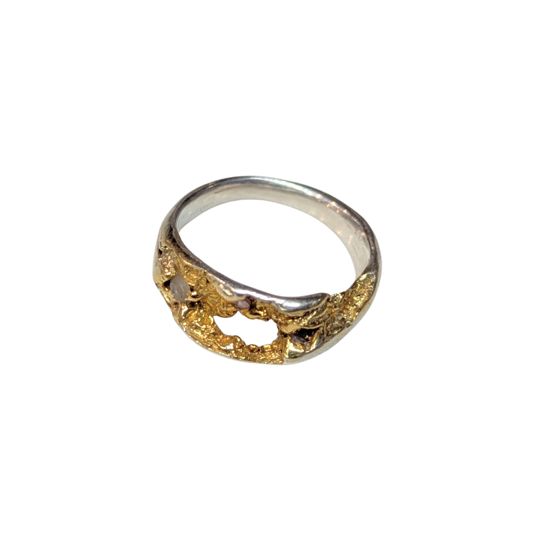 CLAIRE QUICK - Beneath the Surface carved textured sterling silver ring with 3 different shades of pink  sapphires, and the textured surface gold plated
