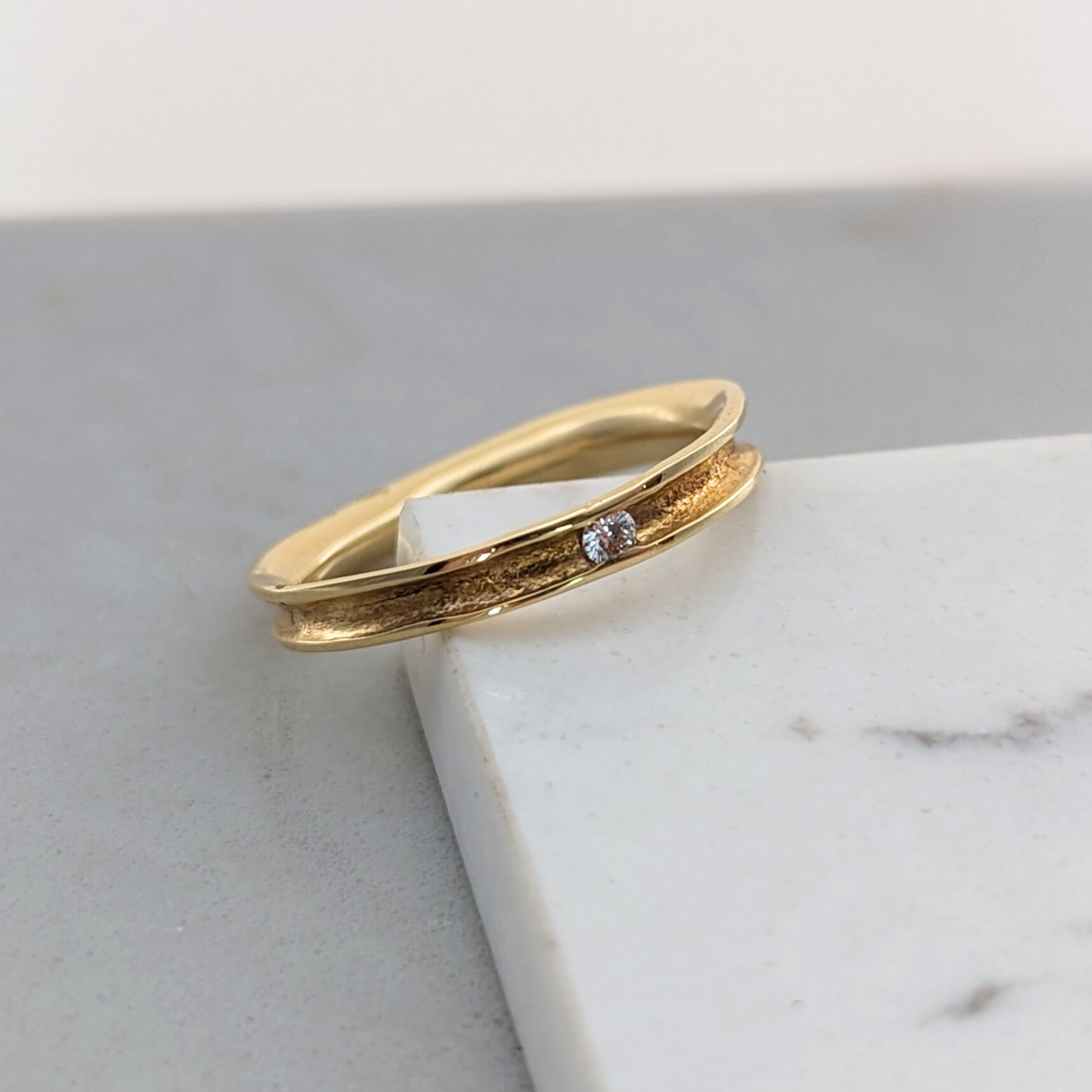 KATE HODGSON - 18ct Yellow Gold Tension Set Single Diamond Band