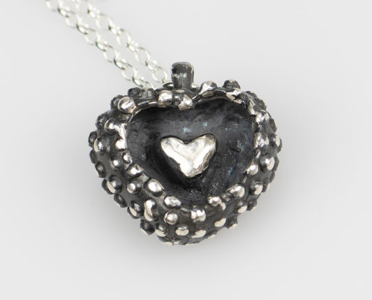 CLAIRE QUICK - Hand carved silver heart with an oxidised finish