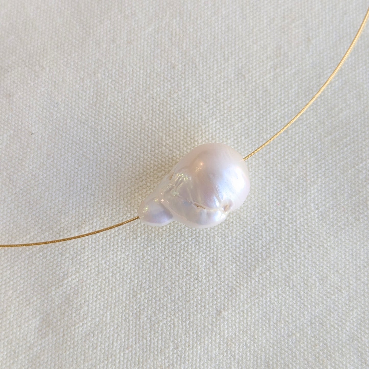 ANNE MORGAN - Baroque pearl and gold plated steel cable