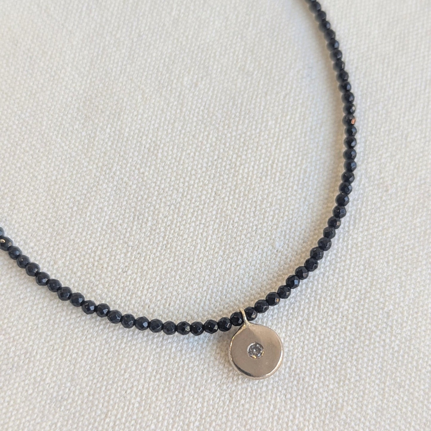 ANNE MORGAN - Onyx Beaded Necklace with Diamond Pendant set in 9ct Yellow Gold