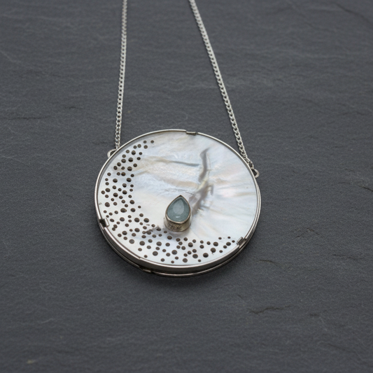 ANNE MORGAN - Seren-Y-Mor Mother of Pearl erosion pendant on silver chain, with aquamarine