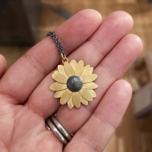 DIANA GREENWOOD  Necklace. Silver, gold plated Rudbeckia Flower