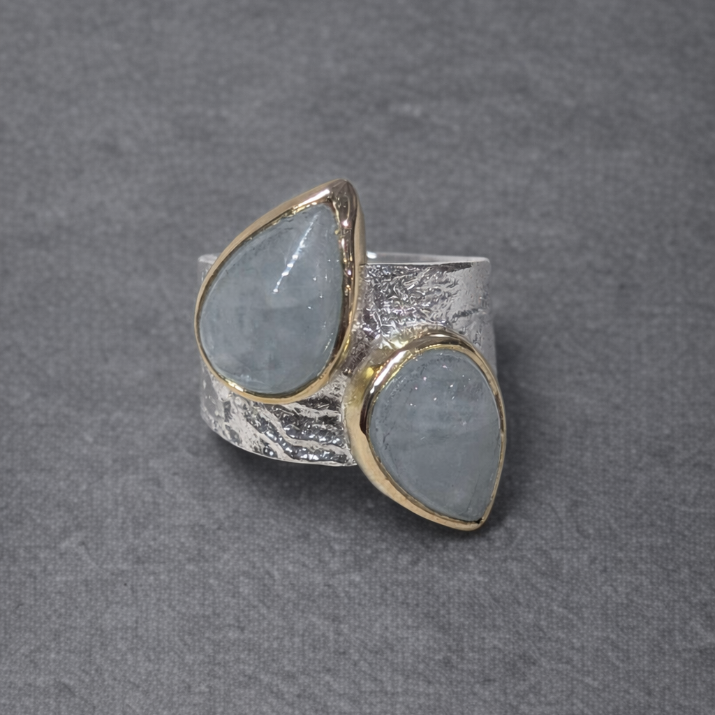 ANNE MORGAN - Luna ring with two pair shape cabochon aquamarines