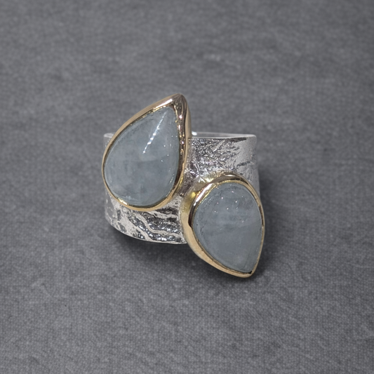 ANNE MORGAN - Luna ring with two pair shape cabochon aquamarines