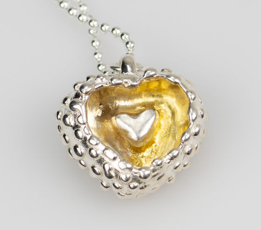 Hand carved silver heart