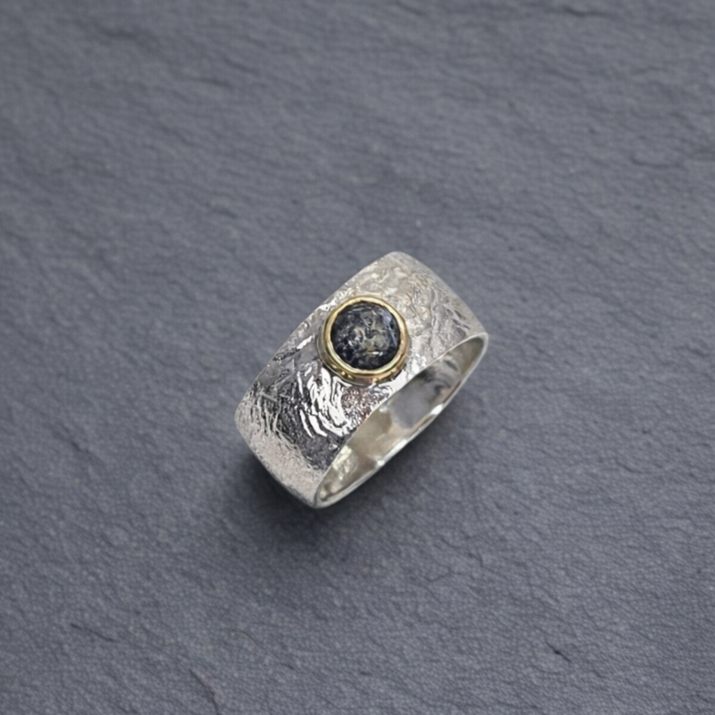 ANNE MORGAN  - Silver Orb ring with 18ct salt and pepper diamond