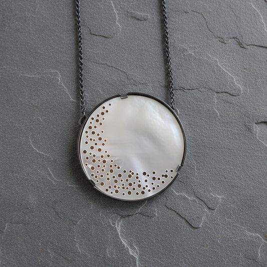 ANNE MORGAN - Mother of Pearl erosion pendant on oxidised chain